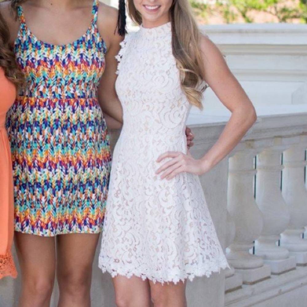 White lace dress with key hole back